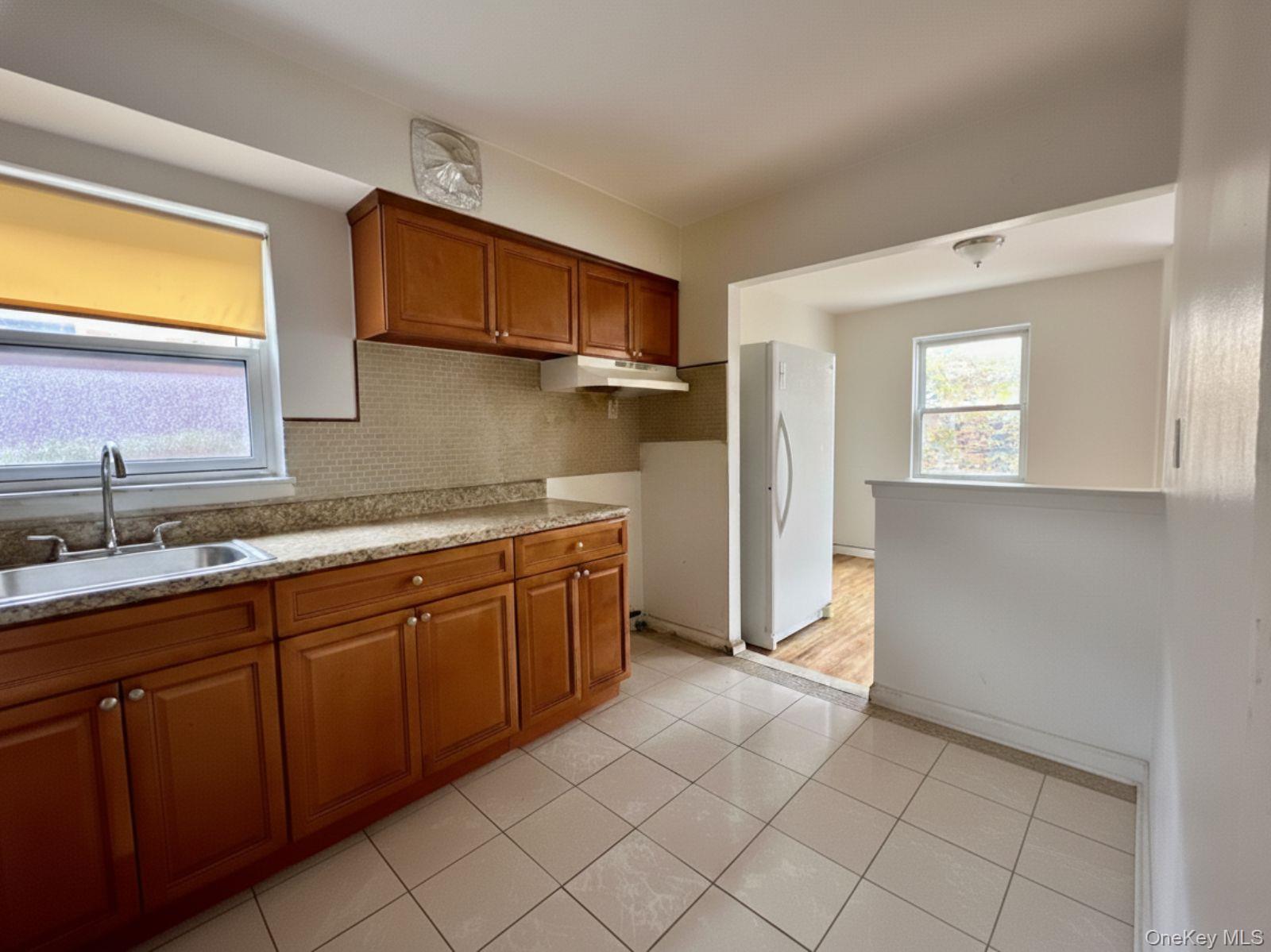 42-23 68 Street – For Sale photo 2