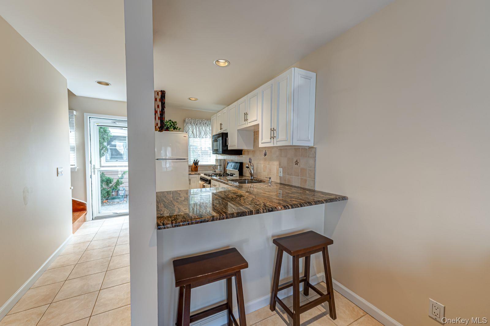 49 Canoe Place Road, Unit 212 photo 5