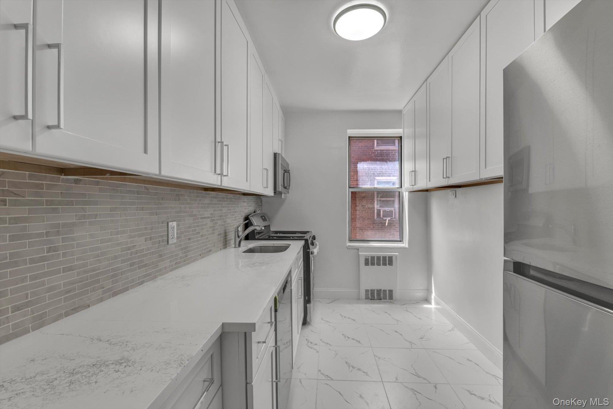 67-12 Yellowstone Boulevard, Unit E9 photo 11