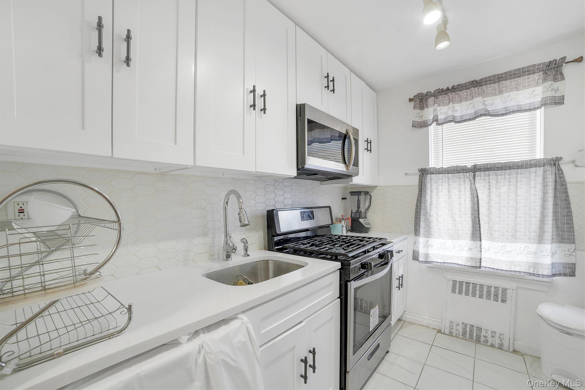 2750 Olinville Avenue, Unit 1K photo 11