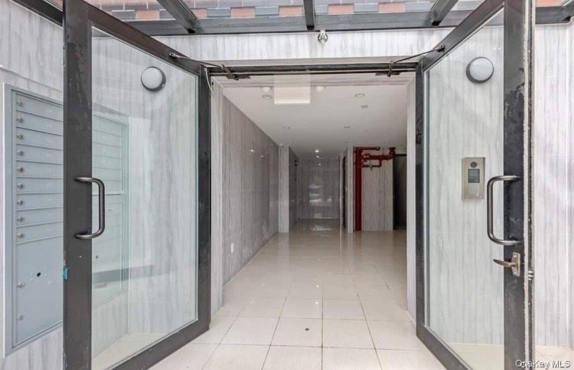 214-11 35th Avenue, Unit C10 photo 3