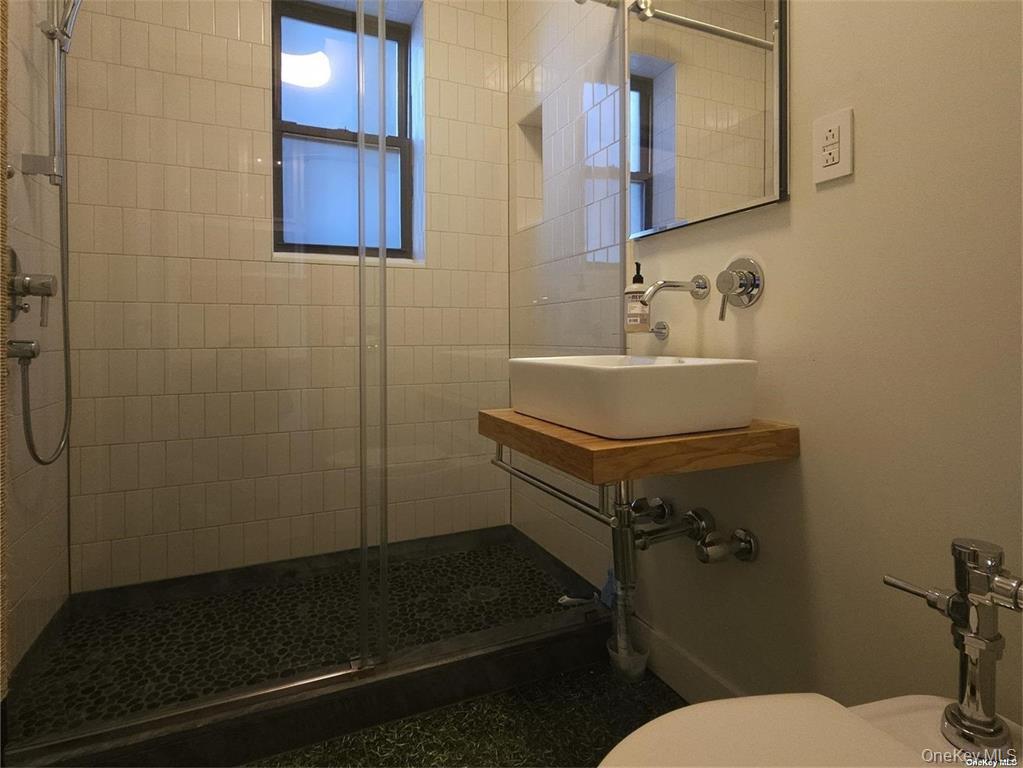 82-16 34th Avenue, Unit 4H photo 8