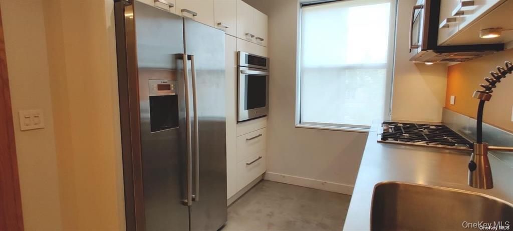 82-16 34th Avenue, Unit 4H photo 2